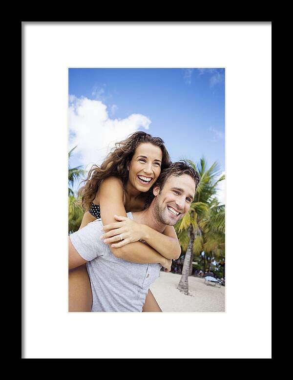 Tranquility Framed Print featuring the photograph Couple on beach on summer day #3 by Felix Wirth