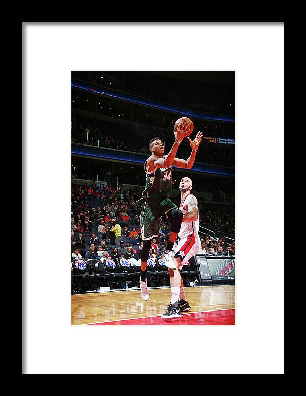 Nba Pro Basketball Framed Print featuring the photograph Giannis Antetokounmpo by Ned Dishman