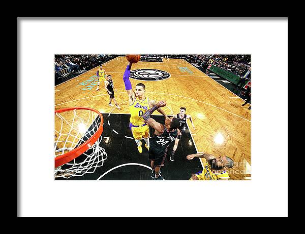 Nba Pro Basketball Framed Print featuring the photograph Kyle Kuzma by Nathaniel S. Butler