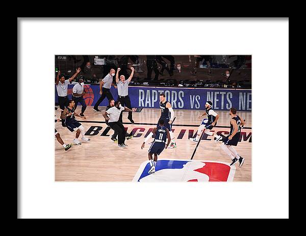 Luka Doncic Framed Print featuring the photograph Los Angeles Clippers v Dallas Mavericks - Game Four by David Dow