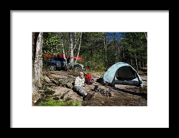Camping Framed Print featuring the photograph Man camping at the riverbank with a canoe #3 by Max shen
