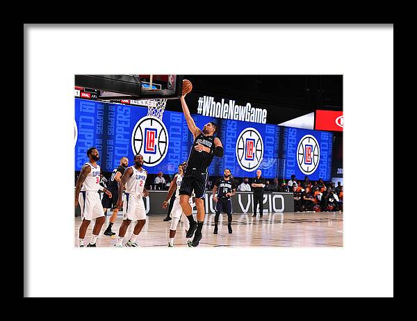 Nikola Vucevic Framed Print featuring the photograph Orlando Magic v Los Angeles Clippers #3 by Jesse D. Garrabrant