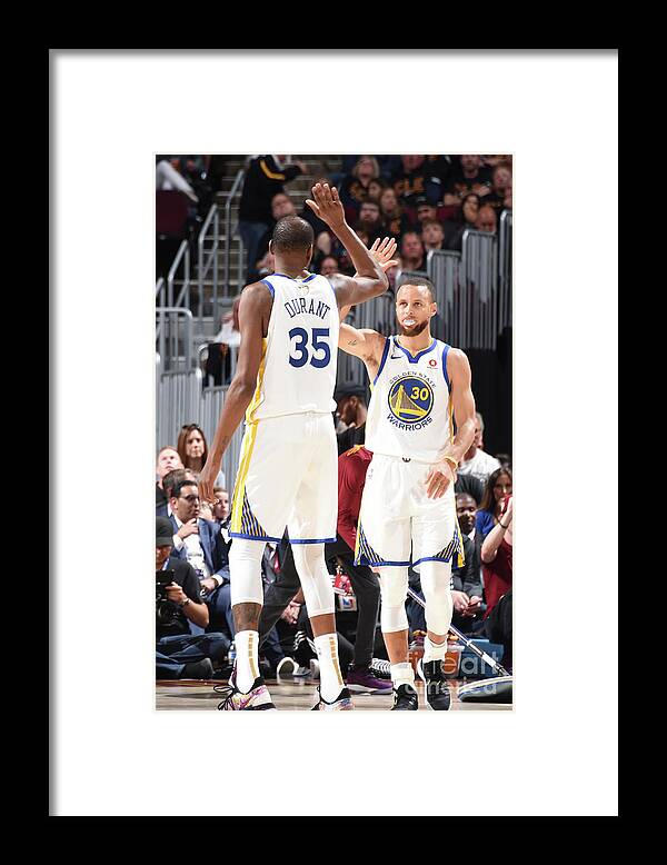 Kevin Durant Framed Print featuring the photograph Stephen Curry and Kevin Durant by Andrew D. Bernstein