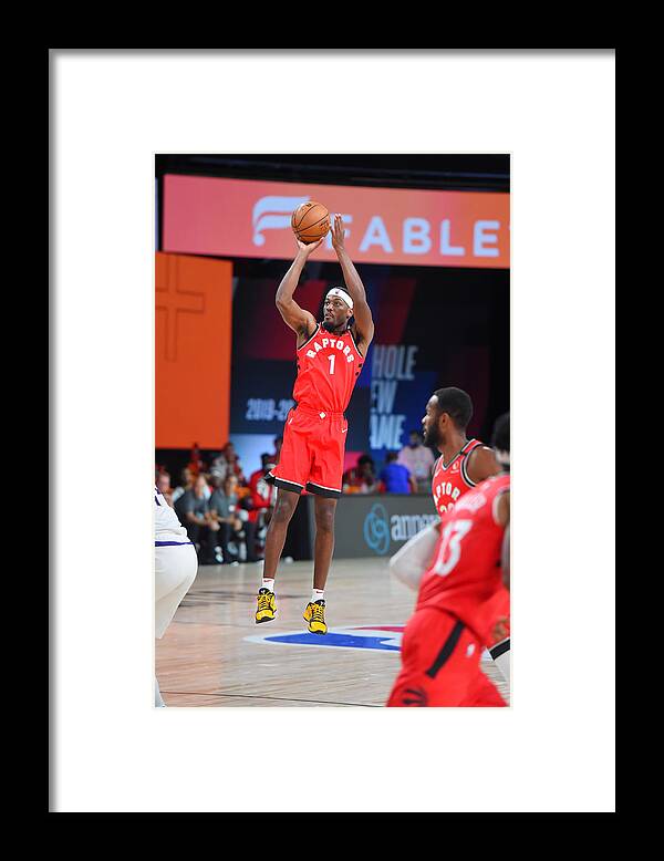 Paul Watson Framed Print featuring the photograph Toronto Raptors v Phoenix Suns by Bill Baptist