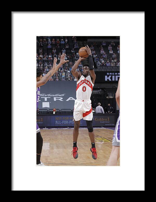 Nba Pro Basketball Framed Print featuring the photograph Toronto Raptors v Sacramento Kings by Rocky Widner
