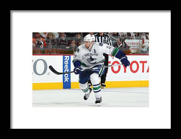 National Hockey League Framed Print featuring the photograph Vancouver Canucks v Philadelphia Flyers #3 by Jim McIsaac