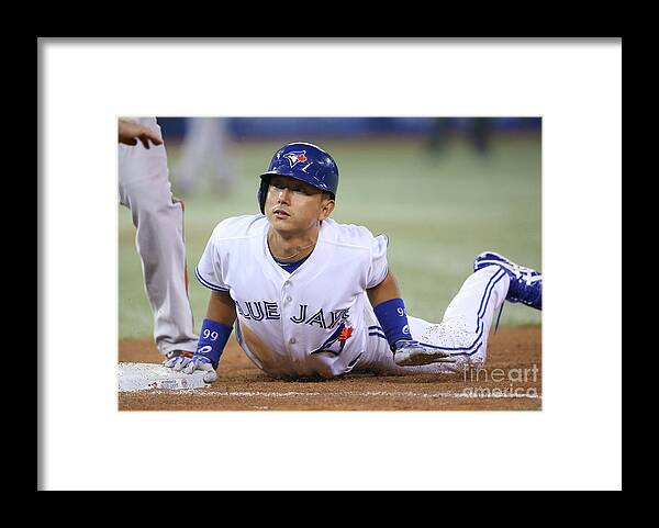 American League Baseball Framed Print featuring the photograph Jay Rogers by Tom Szczerbowski