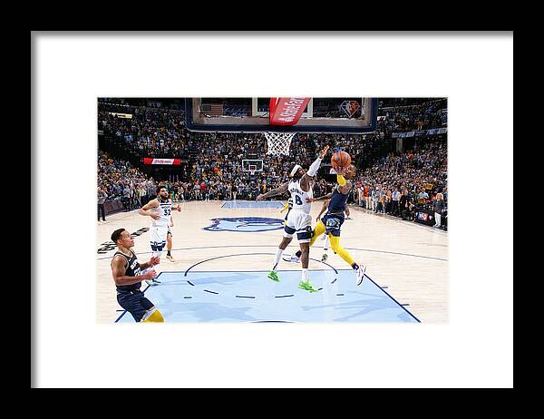 Ja Morant Framed Print featuring the photograph 2022 NBA Playoffs - Minnesota Timberwolves v Memphis Grizzlies by Joe Murphy