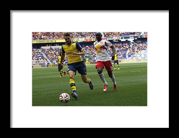 Sports Ball Framed Print featuring the photograph Arsenal v New York Red Bulls - Pre-Season Friendly #4 by Jeff Zelevansky