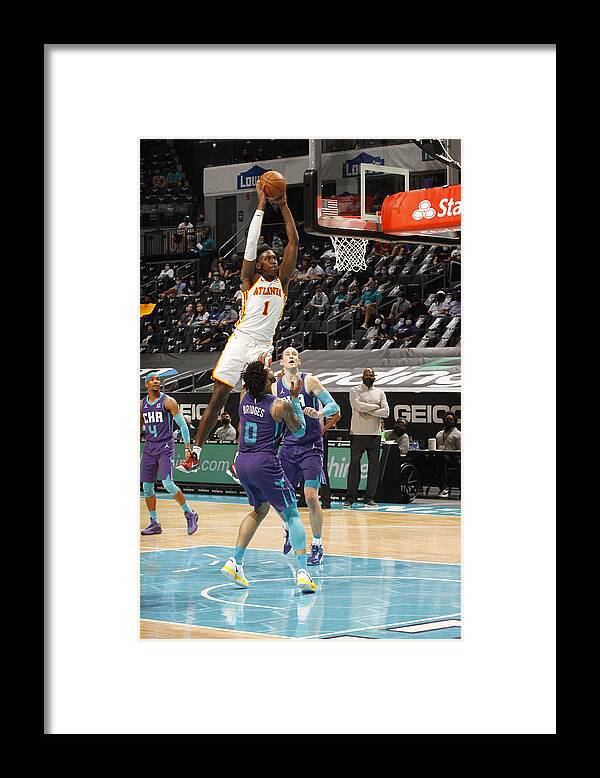Nathan Knight Framed Print featuring the photograph Atlanta Hawks v Charlotte Hornets by Kent Smith