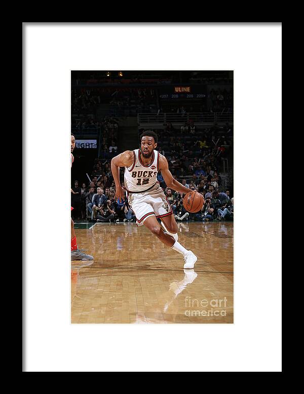 Nba Pro Basketball Framed Print featuring the photograph Jabari Parker by Gary Dineen