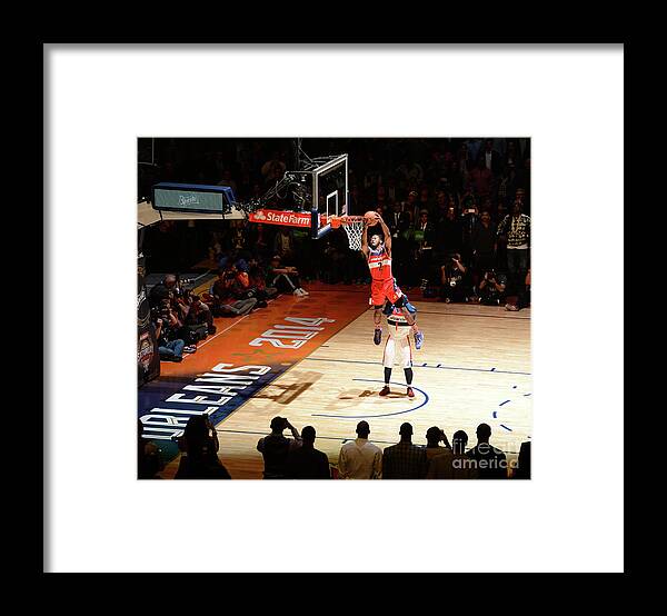 Smoothie King Center Framed Print featuring the photograph John Wall by Garrett Ellwood