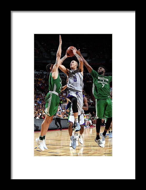 Kyle Kuzma Framed Print featuring the photograph Kyle Kuzma #4 by Garrett Ellwood