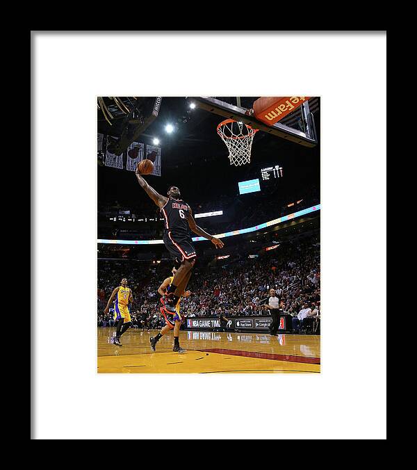 Nba Pro Basketball Framed Print featuring the photograph Lebron James #4 by Mike Ehrmann