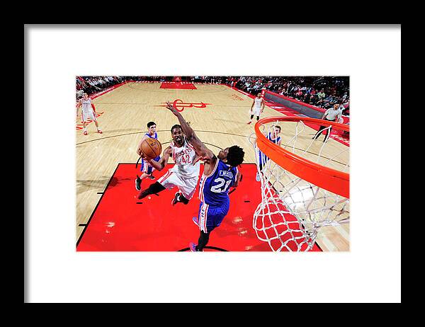 Nba Pro Basketball Framed Print featuring the photograph Nene Hilario by Bill Baptist