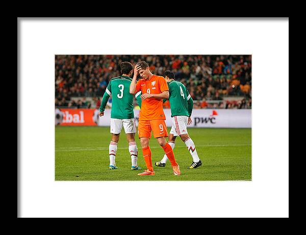 Grass Framed Print featuring the photograph Netherlands v Mexico - International Friendly #4 by Dean Mouhtaropoulos