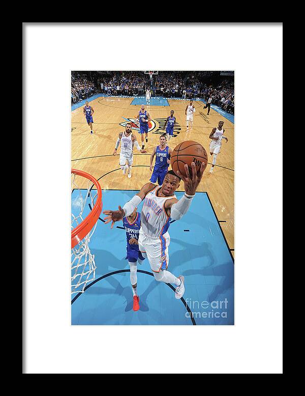 Russell Westbrook Framed Print featuring the photograph Russell Westbrook by Andrew D. Bernstein