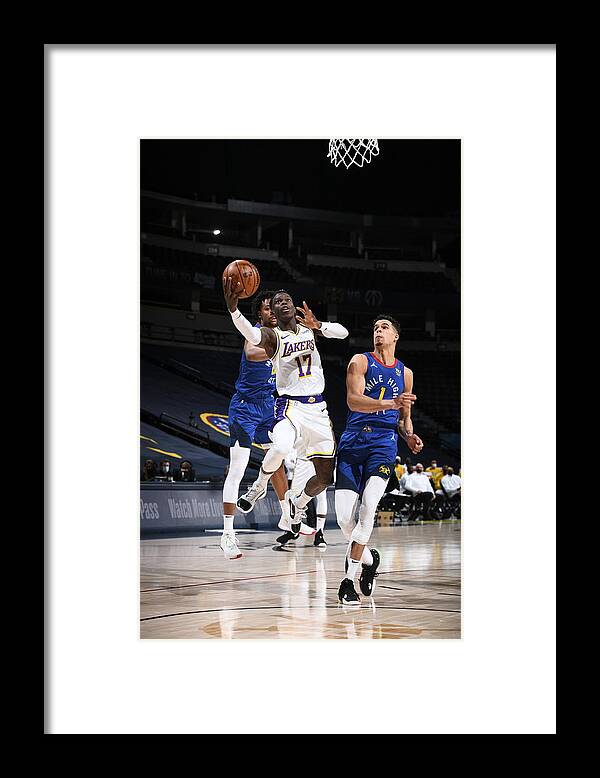 Dennis Schroder Framed Print featuring the photograph Los Angeles Lakers v Denver Nuggets #5 by Garrett Ellwood