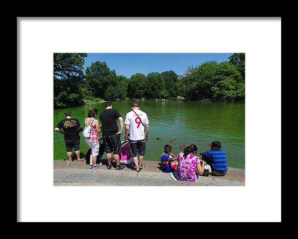 Crowd Of People Framed Print featuring the photograph New Yorkers in central Park #5 by HaizhanZheng