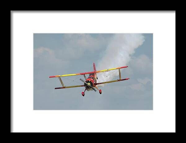 Red Framed Print featuring the photograph Red and Yellow Airplane by Carolyn Hutchins