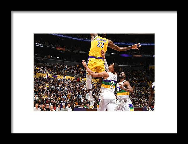 Nba Pro Basketball Framed Print featuring the photograph Lebron James - Tribute to Kobe by Andrew Bernstein
