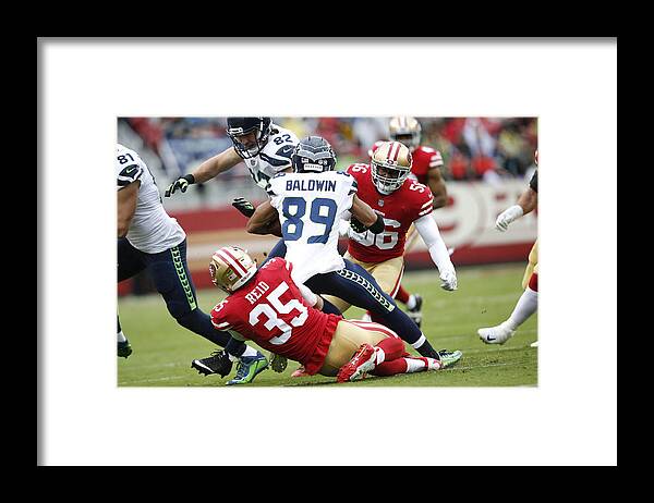 People Framed Print featuring the photograph Seattle Seahawks v San Francisco 49ers #56 by Michael Zagaris