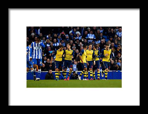 Celebration Framed Print featuring the photograph Brighton & Hove Albion v Arsenal - FA Cup Fourth Round #6 by Mike Hewitt