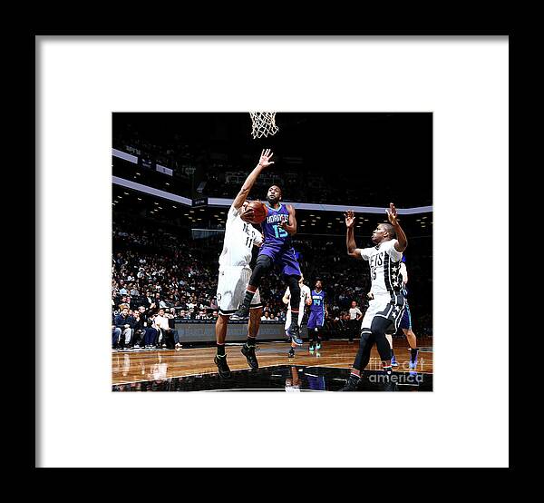 Kemba Walker Framed Print featuring the photograph Kemba Walker by Nathaniel S. Butler
