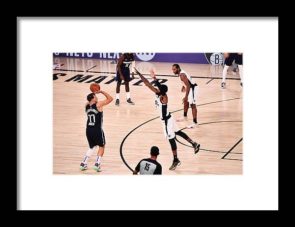 Playoffs Framed Print featuring the photograph Los Angeles Clippers v Dallas Mavericks - Game Four by David Dow