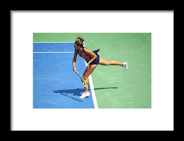 Monica Puig Framed Print featuring the photograph TENNIS: AUG 01 Citi Open #6 by Icon Sportswire