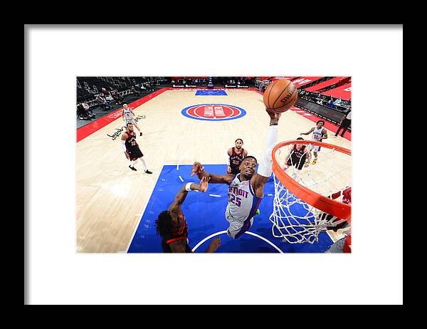Tyler Cook Framed Print featuring the photograph Toronto Raptors v Detroit Pistons by Chris Schwegler