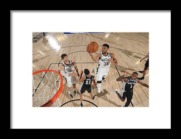 Nba Pro Basketball Framed Print featuring the photograph Giannis Antetokounmpo by Jesse D. Garrabrant