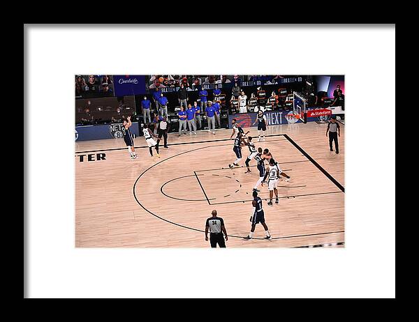 Luka Doncic Framed Print featuring the photograph Los Angeles Clippers v Dallas Mavericks - Game Four by David Dow
