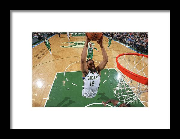 Nba Pro Basketball Framed Print featuring the photograph Jabari Parker by Gary Dineen