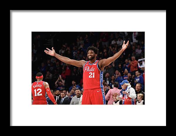 Joel Embiid Framed Print featuring the photograph Joel Embiid by David Dow
