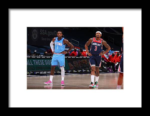 Nba Pro Basketball Framed Print featuring the photograph John Wall and Bradley Beal by Ned Dishman