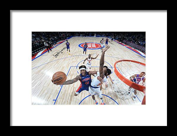 Saddiq Bey Framed Print featuring the photograph New York Knicks v Detroit Pistons #8 by Chris Schwegler