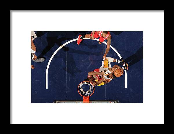 Paul George Framed Print featuring the photograph Paul George by Ron Hoskins