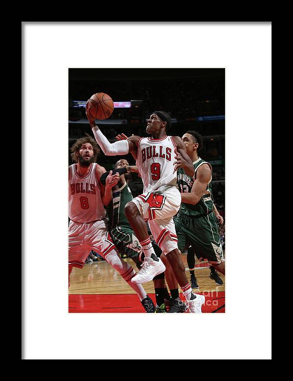 Nba Pro Basketball Framed Print featuring the photograph Rajon Rondo by Gary Dineen