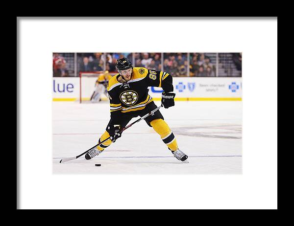 People Framed Print featuring the photograph Calgary Flames v Boston Bruins #9 by Maddie Meyer