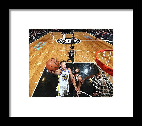 Nba Pro Basketball Framed Print featuring the photograph Stephen Curry by Nathaniel S. Butler