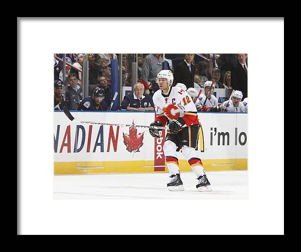 National Hockey League Framed Print featuring the photograph Calgary Flames v Edmonton Oilers #97 by Dale MacMillan