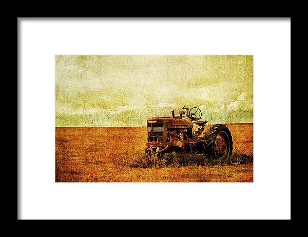 Tractor Framed Print featuring the photograph A Bit Old and Rusty by Elin Skov Vaeth