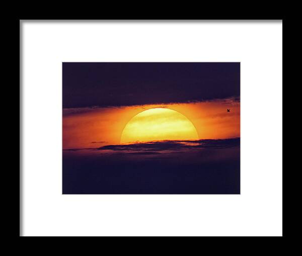 Sunrise Framed Print featuring the photograph A Break In The Clouds by Ron Dubin