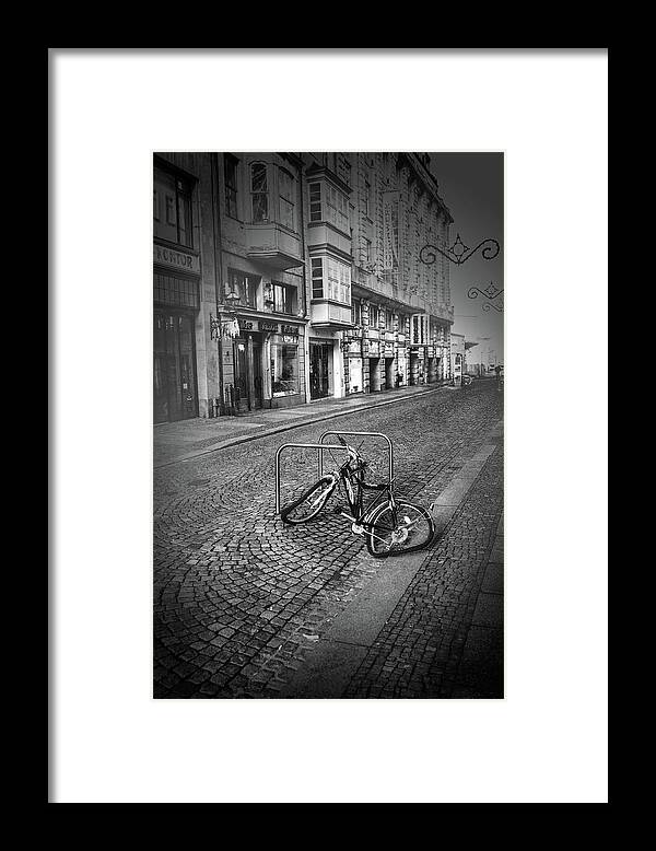 Leipzig Framed Print featuring the photograph A Broken Bicycle in Leipzig Germany by James C Richardson