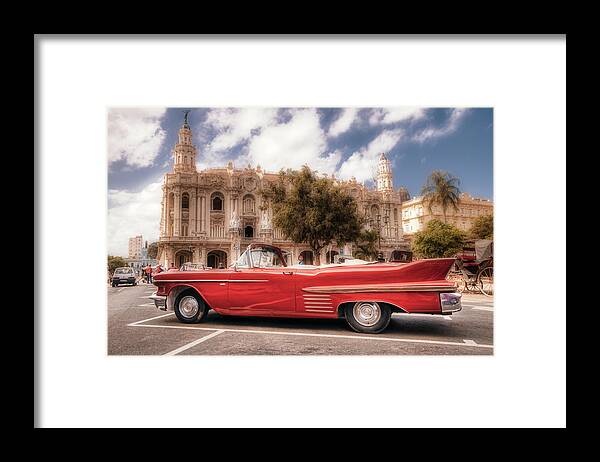 La Habana Framed Print featuring the photograph A Cadillac and the Hotel Inglaterra by Micah Offman