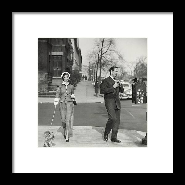 Couple Framed Print featuring the photograph A Couple Mailing A Letter In New York City by Frances McLaughlin-Gill
