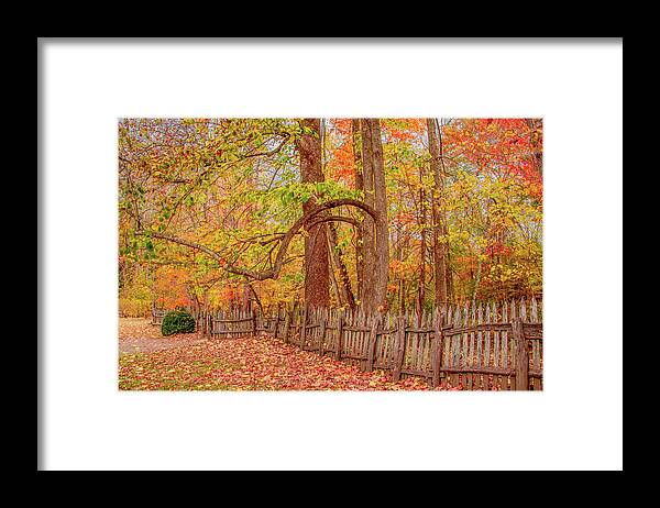 Oconaluftee Framed Print featuring the photograph A Crooked Old Fence in the Shadow of Fall by Marcy Wielfaert