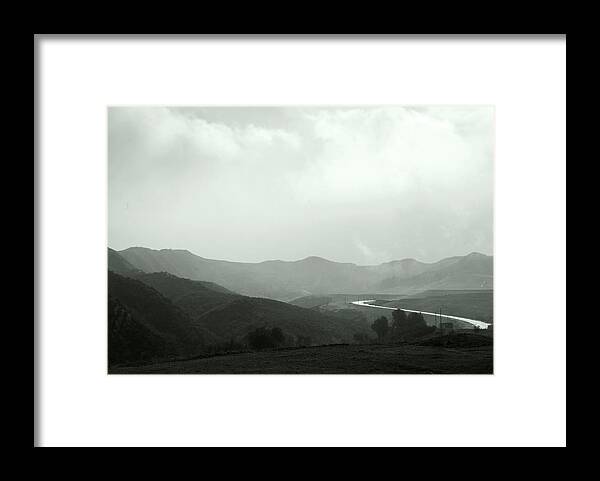 Mountains Framed Print featuring the photograph A Distant Road by Kathleen Grace