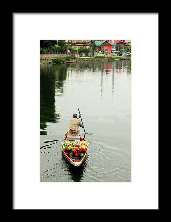 Srinagar Framed Print featuring the photograph A flowerman in Dal lake by Rbb